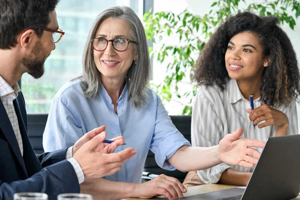 Diverse professionals discussing a career path