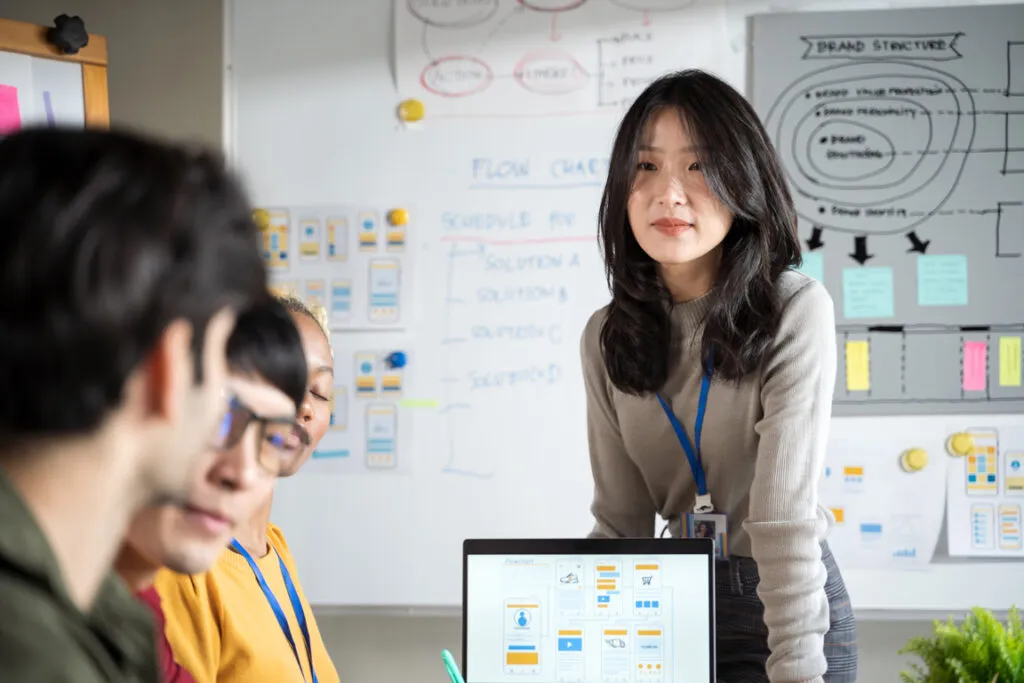 Designers presenting a user experience concept to their team